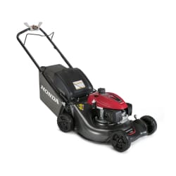 Red and black push lawn mower with grass collection bag on a white background.