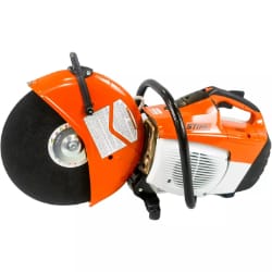 Orange and black power saw laying on its side against a white background.