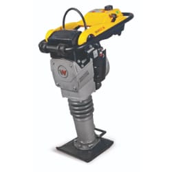 Vibratory compactor with a yellow handle and gray motor, designed for compacting soil in construction work.