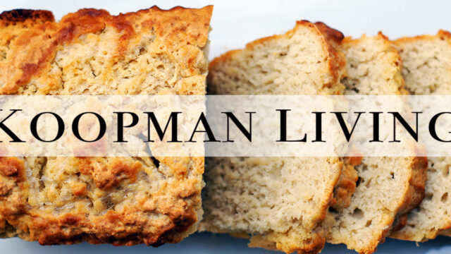 Sliced banana bread with a crispy crust sits on a white surface, text overlay reads "Topman Live".