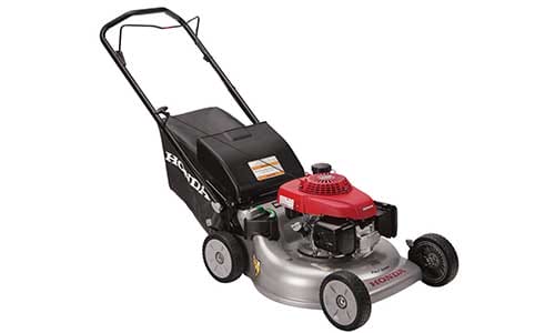 Red and black push lawn mower on a white background.