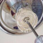 remove cap and screw
