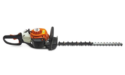 Gas-powered hedge trimmer with orange and black engine, shown on a white background.