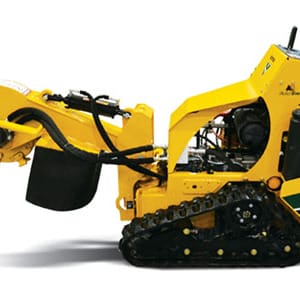 Yellow tracked trencher machine on white background suitable for landscaping and construction tasks.
