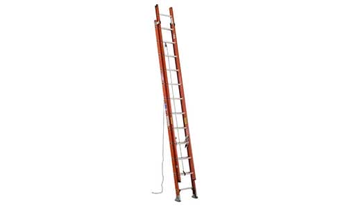 Red and silver extension ladder standing upright on a white background.
